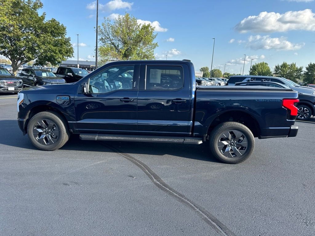 Used 2023 Ford F-150 Lightning Lariat with VIN 1FTVW1ELXPWG20309 for sale in Mankato, Minnesota